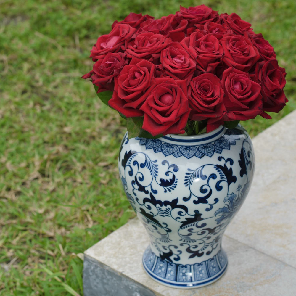 Uli toile vase with premium roses
